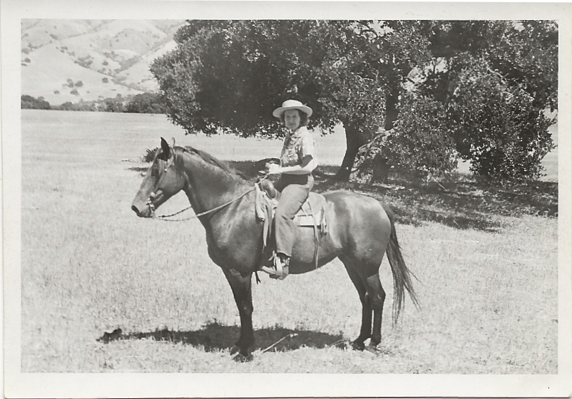 Marion Boisot Ford riding a horse on the ranch.
